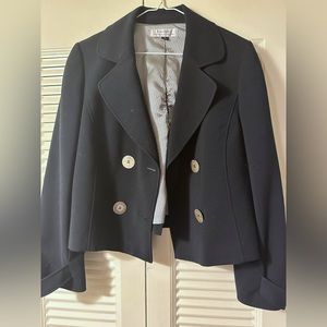 Women’s suit jackets, sizes 12 & 14.